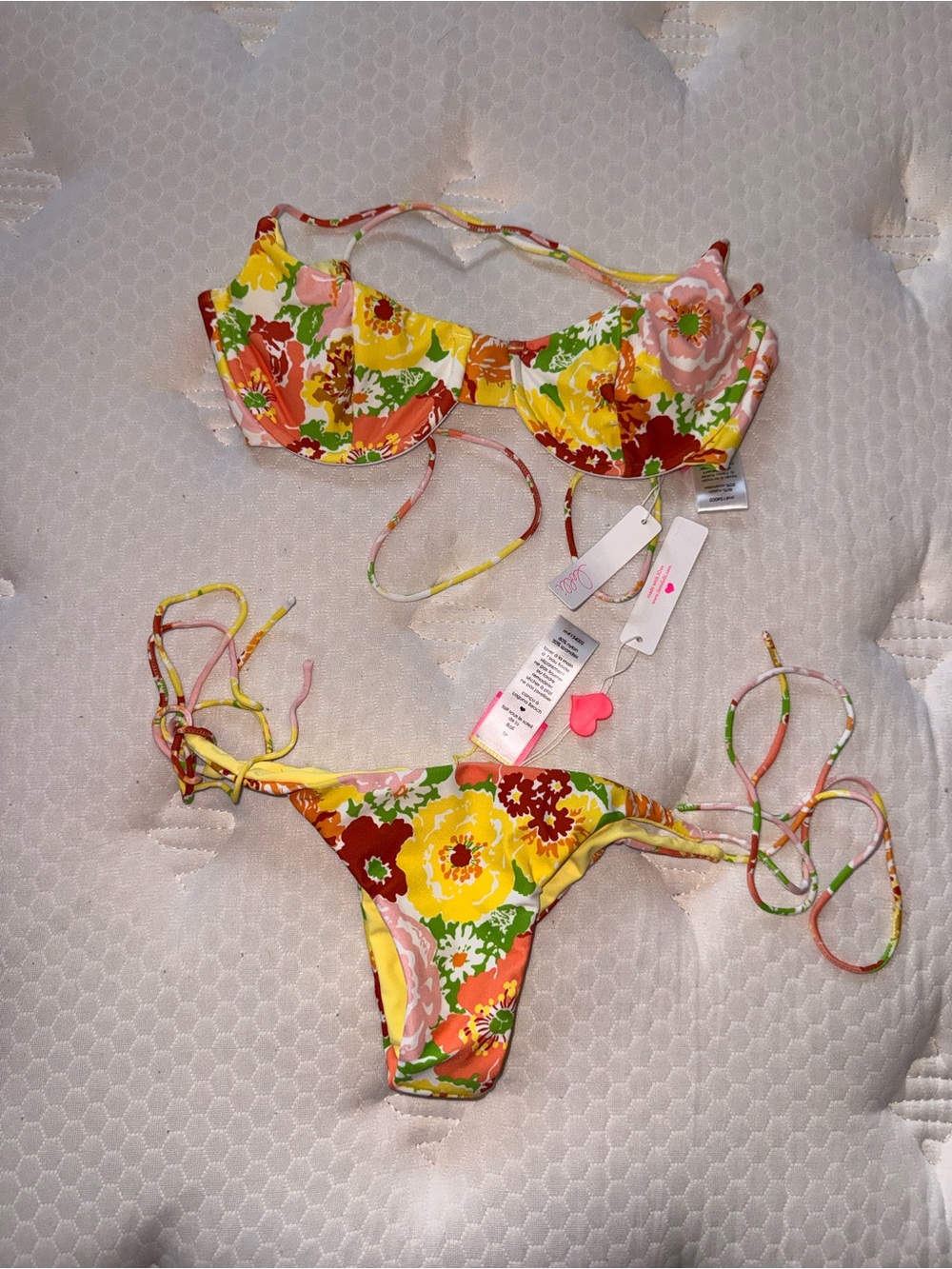 154. Lolli swim bikini set with yellow, red, and green floral print.